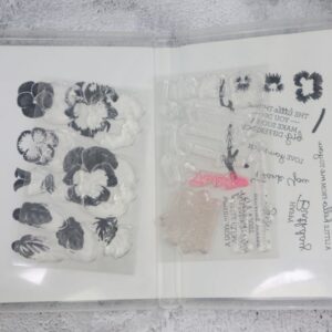 Inside view of Pansy Patch stamp set with photopolymer stamps attached to case