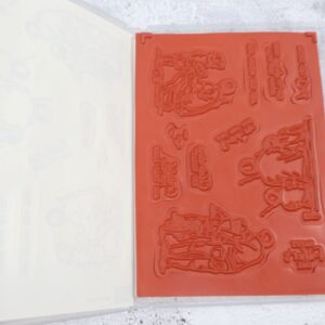 Inside view of Beside Me Stamp Set with red cling rubber stamps