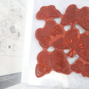 Close-up of Butterfly Brilliance background stamp with six butterflies in one image