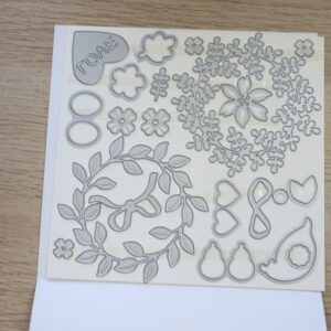 Wreath Builder coordinating dies laid out on magnetic sheet.