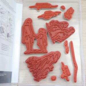 Inside view of Beautiful Moments stamp set with red rubber stamps