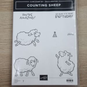 Counting Sheep cling stamp set featuring three sheep, sentiments, and party-themed images