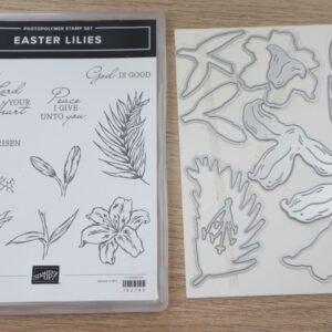 Easter Lilies stamp set displayed beside coordinating Easter Lilies Dies on a wooden background.