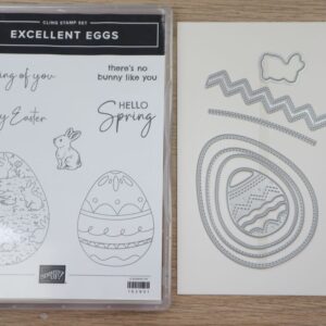 Excellent Eggs stamp set and coordinating dies displayed on a desk.