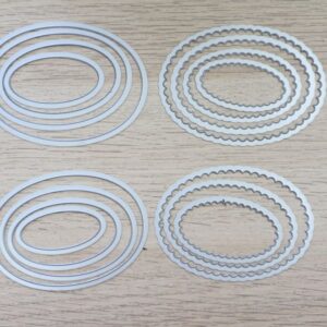 Layering Oval Dies set displayed on a wooden surface, showing both scalloped and straight-edge nested oval dies.