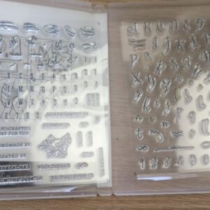 Inside view of Stampin’ Up! Make a Difference stamp set showing two clear photopolymer stamp sheets with alphabets, numbers, sentiments and floral accents.