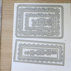 Ornate Layers Dies set displayed on white cardstock