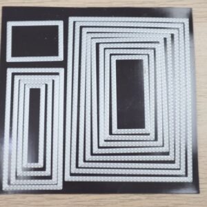 Stitched Rectangle Dies displayed on magnetic sheet with multiple nested rectangle sizes.