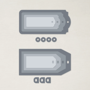 Tailor Made Tags Dies shown layered to display nested tag shapes and reinforcers