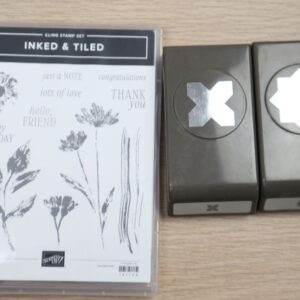 Inked & Tiled stamp set with two coordinating punches displayed together.